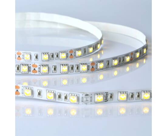 Светодиодная лента Uniel ULS-M25-5050-60LED/m-10mm-IP20-DC12V-14,4W/m-5M-3000K PROFI катушка в герме